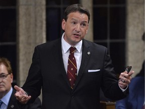 Minister of Natural Resources Greg Rickford responds to a question during Question Period in the House of Commons Tuesday June 17, 2014 in Ottawa.