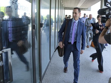 Defendant Michael Sona arrives at the courthouse in Guelph Ontario for the first day of the Robocalls trial on June 2, 2014. The trial will focus on allegations that Sona was responsible for robocalls or real-person calls were made to voters (mostly in the riding of Guelph, Ontario) to dissuade voters from casting ballots in the May, 2011 federal election, by telling them the their polling station location had been changed.