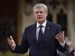 Prime Minister Stephen Harper answers a question during Question Period in the House of Commons on Parliament Hill in Ottawa, Tuesday June 17, 2014 . Harper is the focus of a new Conservative party ad trumpeting his economic leadership.