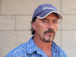 Ian Conklin poses for a photo outside the provincial courthouse in Ottawa on June 27, 2014. (Jana Chytilova / Ottawa Citizen)  ORG XMIT: 0628 Conklin 02