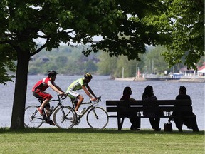 Cyclists in Britannia Park enjoy the long-awaited warm weather on Monday, June 2.