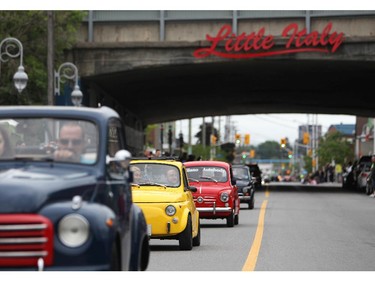 Italian made cars make their way along Preston St. in Ottawa's Little Italy, during Italian Festival on Saturday, June 14, 2014.