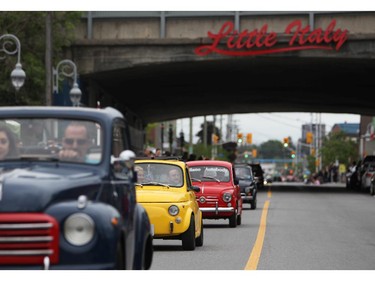 Italian made cars make their way along Preston St. in Ottawa's Little Italy, during Italian Festival on Saturday, June 14, 2014.