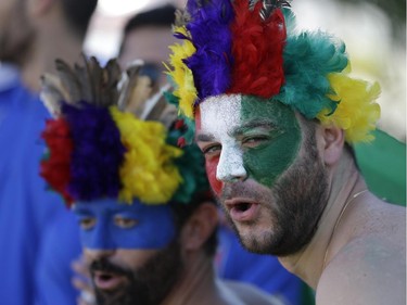 Italy fans stroll in downtown Manaus prior to the England vs Italy match during the 2014 soccer World Cup in Arena da Amazonia in Manaus, Brazil, Saturday, June 14, 2014.