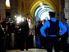 Leader of the Opposition in the Senate, Senator James Cowan speaks to media in the foyer of the Senate on Parliament Hill in Ottawa on Friday, October 25, 2013. The Conservatives in the Senate have given notice of their intent to bring the proposed suspension of three former Tories to a vote as early as Tuesday.