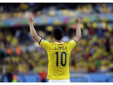 Colombia's James Rodriguez (10) waves to fans following his team's 3-0 victory over Greece during the group C World Cup soccer match between Colombia and Greece at the Mineirao Stadium in Belo Horizonte, Brazil, Saturday, June 14, 2014.
