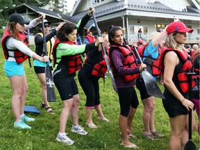 Jennifer Hooper, in green jacket, second from left, team captain of the Brain Wave dragon boat team representing the Brain Injury Association of Canada, in dry land rehearsals.