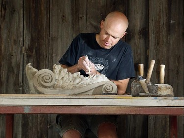 John-Philippe Smith models a clay Mascarov at the shop. The ancient trade of stonemasonry is making a revival on Parliament Hill, and Danny Barber and John-Philippe Smith (founders of Smith and Barber stonemasons in Ottawa) are two of the mason/sculptors recreating the stone carvings there.