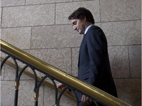 Liberal Leader Justin Trudeau leaves a news conference after speaking with the media following caucus on Parliament Hill Wednesday June 18, 2014 in Ottawa.