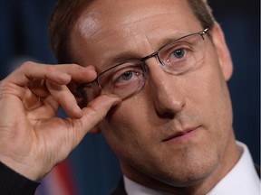 Justice Minister Peter MacKay addresses a news conference on Parliament Hill in Ottawa on Wednesday, June 4, 2014.