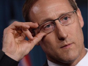 Justice Minister Peter MacKay addresses a news conference on Parliament Hill in Ottawa on Wednesday, June 4, 2014.