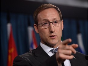 Justice Minister Peter MacKay takes questions a news conference on Parliament Hill in Ottawa on Wednesday, June 4, 2014.