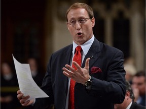 Minister of Justice Peter MacKay stands during question period in the House of Commons on Parliament Hill on in Ottawa on Thursday, June 19, 2014.