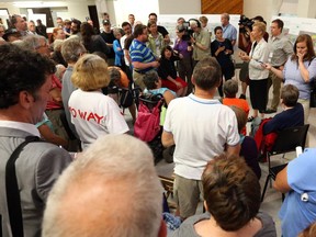 Many people attended the information session about the detour off the Transitway from Tunney�s Pasture to downtown onto Scott and Albert streets at Tom Brown arena in Ottawa, June 16, 2014.