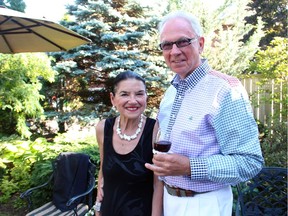 Margaret Dickenson and Larry Dickenson, seen Sunday, June 22, 2014, host a series of annual cocktail receptions, featuring Margaret's own recipes, at their Old Ottawa South home.