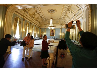 Members of the public visit the Ballroom of Rideau Hall as part of the Doors Open Ottawa weekend on June 7, 2014. Rideau Hall is one of several Ottawa locations participating in the annual event, which invites the public to visit normally restricted locations around the city. Rideau Hall is open all year round for tours, but this weekend visitors can explore at their own pace during open hours, as well as take pictures.