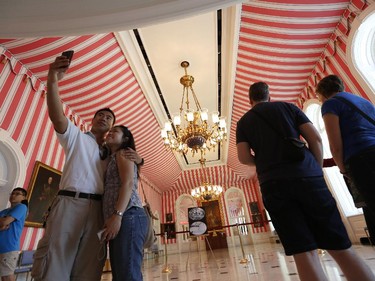 Members of the public visit the Tent Room of Rideau Hall as part of the Doors Open Ottawa weekend on June 7, 2014. Rideau Hall is one of several Ottawa locations participating in the annual event, which invites the public to visit normally restricted locations around the city. Rideau Hall is open all year round for tours, but this weekend visitors can explore at their own pace during open hours, as well as take pictures.