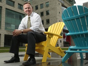 Mike Maguire, photographed outside Ottawa City hall on Wednesday, June 25, 2014, is the only man so far registered to challenge Jim Watson for mayor.
