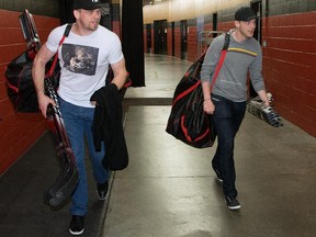 Milan Michalek (L) and Ales Hemsky (R) leave the Canadian Tire Centre after clearing out their lockers at the end of the season.