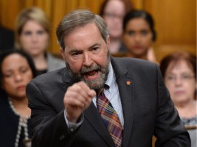 NDP Leader Tom Mulcair asks a question during question period in the House of Commons on Parliament Hill in Ottawa on Monday, June 2, 2014.