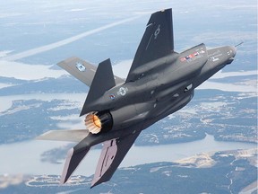 The Conservatives knew before the 2011 election of the cost overruns involved with the purchase of F-35 stealth fighters, senior officials claim.    (UNDATED -- Undated handout photo of theLockheed Martin F-35 Lightning II, Also known as Joint Strike Fighter (JSF) in flight.   HANDOUT PHOTO: Lockheed-Martin.   FILE PHOTO   For Lee Berthiaume (Postmedia News). STEALTH-FIGHTER ORG XMIT: POS2012120318154124) ORG XMIT: POS1212031816223375 ORG XMIT: POS1212061815121154