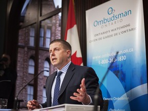 Ontario Ombudsman Andre Marin speaks at a news conference at Queens Park in Toronto on Tuesday February 4, 2014 to announce his latest investigation into complaints about billing practices by Hydro One. THE CANADIAN PRESS/Aaron Vincent Elkaim