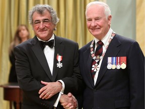 Environmental conservationist Louis LaPierre of Dieppe, N.B., is invested as Member to the Order of Canada by Governor General David Johnston at Rideau Hall in Ottawa Friday November 23, 2012.