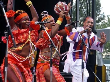 Femi Kuti plays with his band at opening night of RBC Bluesfest 2013 in Lebreton Flats Thursday.