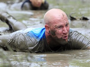Mud is a important part of many obstacle course races. This competitor was in the Ottawa Spartan Race in 2012.