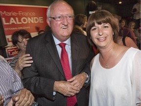 Liberal Marie-France Lalonde and Phil McNeely celebrate her election victory in the riding of Ottawa Orleans.