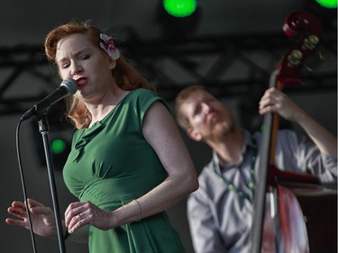 Alex Pangman, left, and double bass player Chris Banks perform on the main stage at the 2014 Ottawa Jazz Festival.