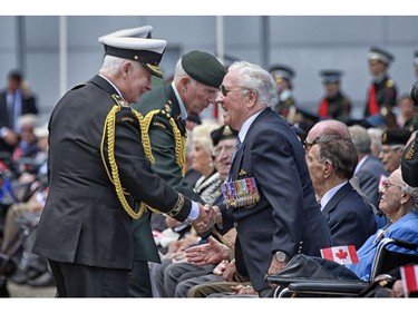 70th Anniversary of D-Day and the Battle of Normandy  David Johnston, Governor General and Commander-in-Chief of Canada, greets veterans at 70th Anniversary of D-Day and the Battle of Normandy  commemorative event on June 6, 2014, at the Canada Aviation and Space Museum, in Ottawa.