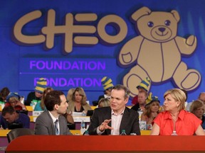 CHEO CEO Alex Munter left, with CTV's Graham Richardson and Carol Anne Meehan at the 2013 CHEO Telethon.