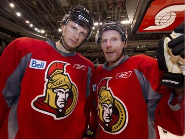 Jason Spezza (L) and Daniel Alfredsson (R) strike a pose as the Ottawa Senators prepare for the NHL playoffs at Scotiabank Place.