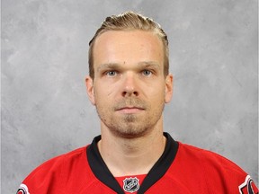 Milan Michalek re-signs with the Senators for three years.