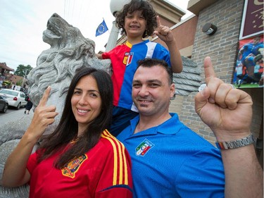 The owners of Sala San Marco banquet hall Tony Zacconi, who is Italian, and his wife Maria Iglesias-Zacconi, who is Spanish, will be cheering for separate countries during the World Cup while their son Amadeo, 5, will be wearing a split jersey. Photo taken at 11:37 on Wednesday, June 11, 2014.