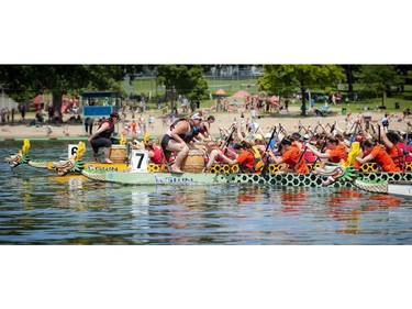 Paddlers hit the water hard Sunday at The 21st Tim Hortons Ottawa Dragon Boat Festival which took place this past weekend at Mooney's Bay Park. (Ashley Fraser / Ottawa Citizen)
