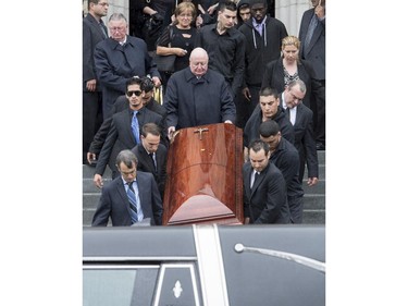 Pallbearers carry the casket of Brandon Volpi down the steps of St. Anthony's Church in Ottawa following his funeral on Friday, June 13, 2014. Volpi, a student at St. Patrick's High School was killed in a stabbing during his prom night in downtown Ottawa. Justin Tang/Ottawa Citizen