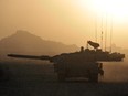 Panjwa'i District, Afghanistan. 15 October 2010 - A Leopard 2A6M Main Battle Tank from The Lord Strathcona's Horse (Royal Canadians) and part of the 1st Battalion, The Royal Canadian Regiment Battle Group, provides over-watch during recent operations in the volatile Panjwa'i and Zhari Districts of Kandahar Province.