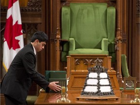 A page works near the Speaker's chair in the House of Commons in this file photo.