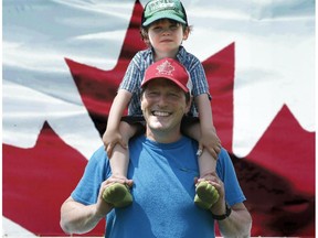 Patrick Boyille and his three-year-old, Peter, seemed already in the festive spirit as they wandered around Parliament Hill Monday, where rehearsals continued on the main stage for Canada Day Tuesday.