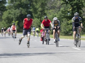 Cyclist and inline skaters enjoy the Sir John A. Macdonald Parkway during the NCC's Sunday Bikeday program.