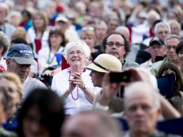 People take in Natalie MacMaster's performance on Monday, June 30, 2014 at the TD Ottawa Jazz Festival held at Confederation Park.