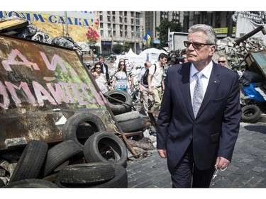 In this photo provided by the German Government Press Office (BPA) German President Joachim Gauck walks past Maidan Square barricades that remain in the centre of Kiev on June 7, 2014 in Kiev, Ukraine. Gauck joined other world leaders in Kiev for the inauguration ceremony of Ukrainian President Petro Poroshenko. Poroshenko was elected on May 25 with a majority in the country's first round of presidential voting.