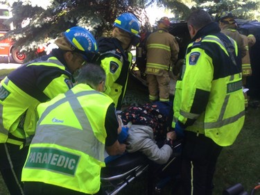 Two people had to be extricated from their vehicle after crashing into a Kanata home on Sunday morning.