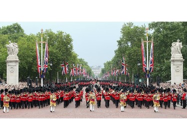 Troops march down the Mall during Trooping the Colour - Queen Elizabeth II's Birthday Parade, at The Royal Horseguards on June 14, 2014 in London, England.