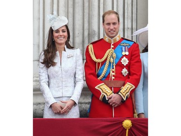 Catherine, Duchess of Cambridge and Prince William, Duke of Cambridge on the balcony during during Trooping the Colour - Queen Elizabeth II's Birthday Parade, at The Royal Horseguards on June 14, 2014 in London, England.