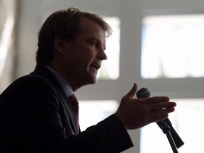 Immigration Minister Chris Alexander speaks during an event in Ottawa on June 20, 2014. The Conservative government has another legal battle on its hands after the Federal Court ruled against controversial reductions to health-care coverage for refugee claimants. Citizenship and Immigration Minister Chris Alexander says the government will appeal Friday's decision by Justice Anne Mactavish, which denounced the cuts as "cruel and unusual" treatment - particularly to the children of claimants who have sought refuge in Canada.
