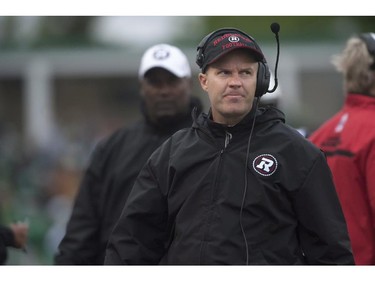 Ottawa Redblacks head coach Rick Campbell looks on as his team takes on the Saskatchewan Roughriders during the second half of CFL pre-season football action in Regina, Sask., Saturday, June 14, 2014. The Riders defeat the Redblacks 21-17.THE CANADIAN PRESS/Liam Richards