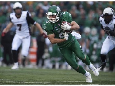 Saskatchewan Roughriders wide receiver Ryan Smith moves the ball against the Ottawa Redblacks during first half of CFL pre-season football action in Regina, Sask., Saturday, June 14, 2014.